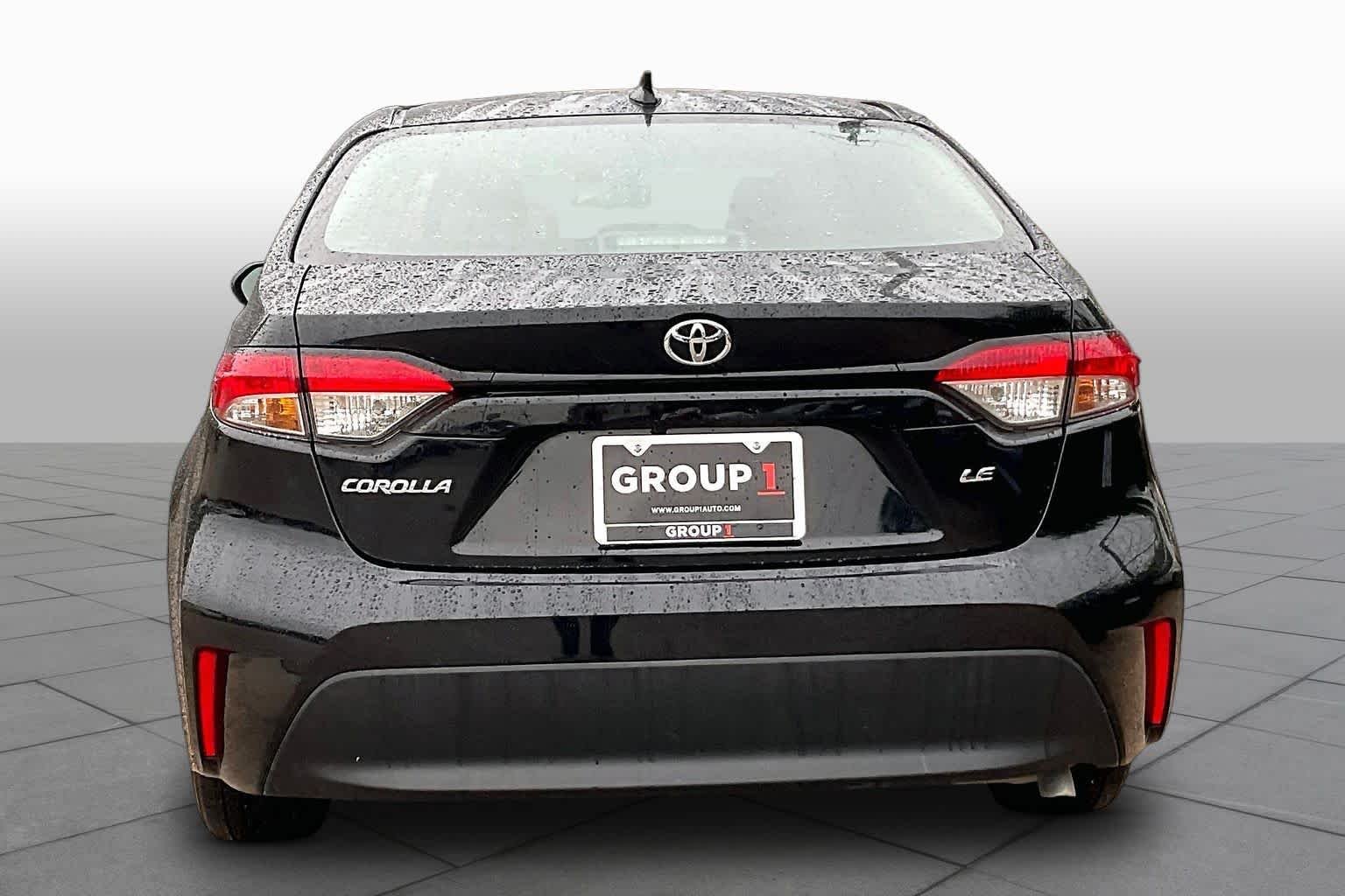 Used 2024 Midnight Black Metallic Toyota LE image 5