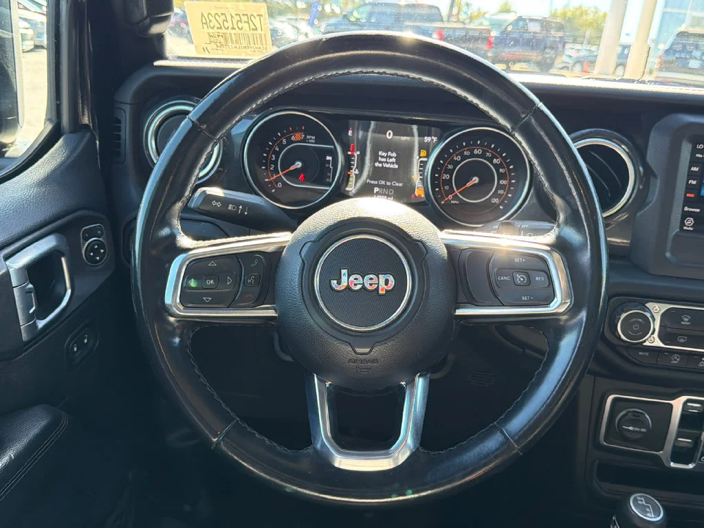 Used 2020 Black Jeep Unlimited Sahara Altitude image 24