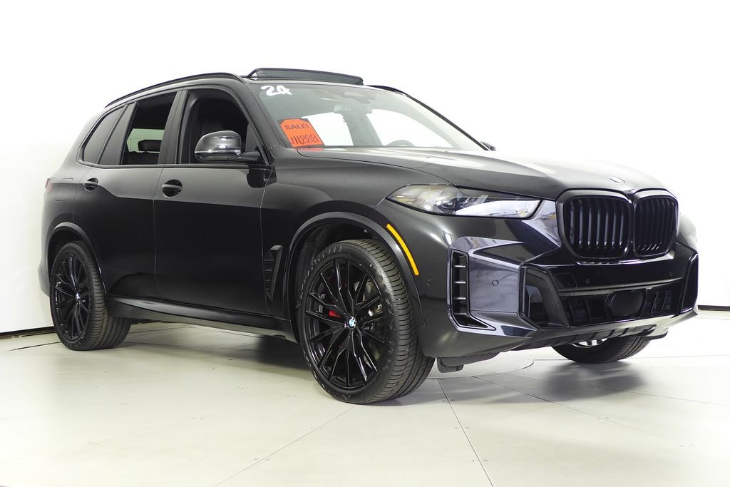 Used 2024 Black Sapphire Metallic BMW sDrive40i image 4