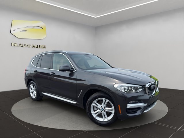 Used 2021 Dark Graphite Metallic BMW xDrive30i image 1