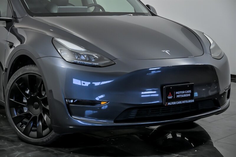 Used 2023 Tesla Model Y Long Range with VIN 7SAYGAEE6PF809946 for sale in Aurora, IL