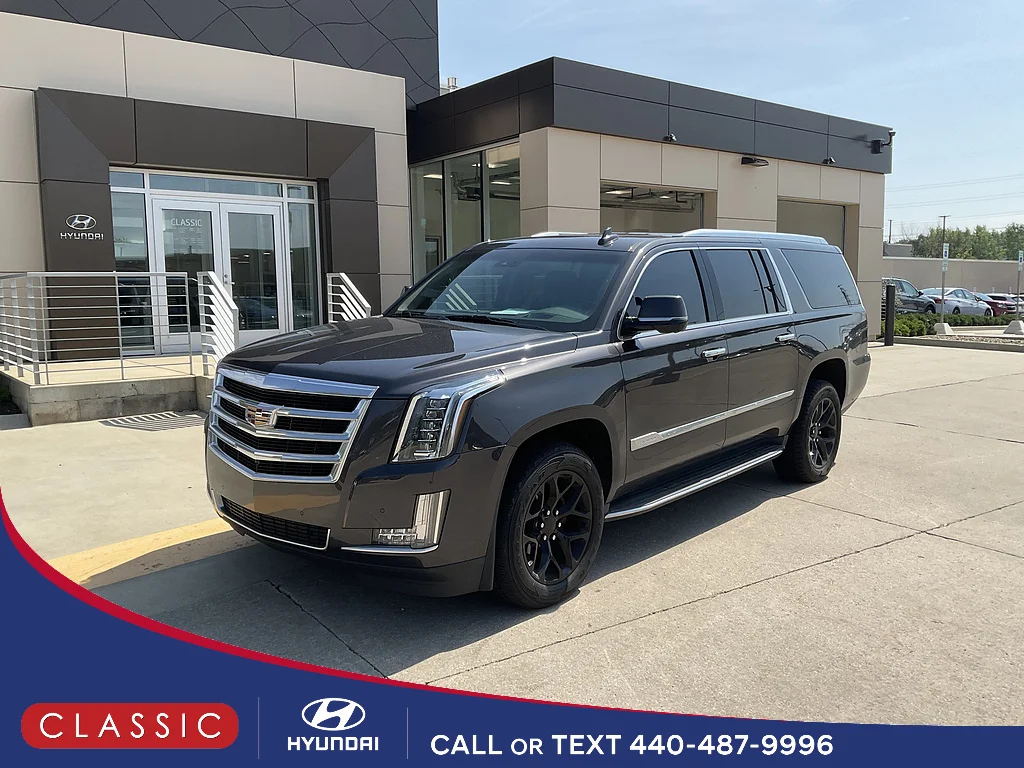 Used 2016 GRAY Cadillac Luxury Collection image 1
