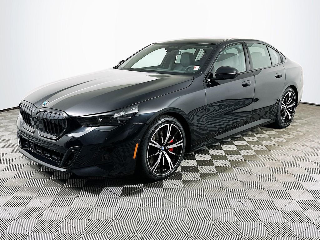 Used 2026 Black Sapphire Metallic BMW 540i xDrive image 1
