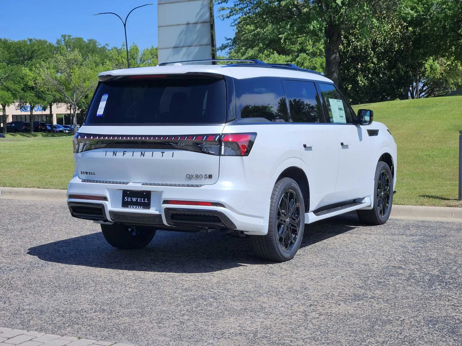 New 2026 RADIANT WHITE INFINITI Sport 4WD image 4