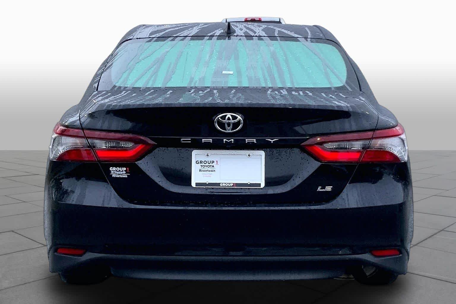 Used 2024 Midnight Black Metallic Toyota LE image 5