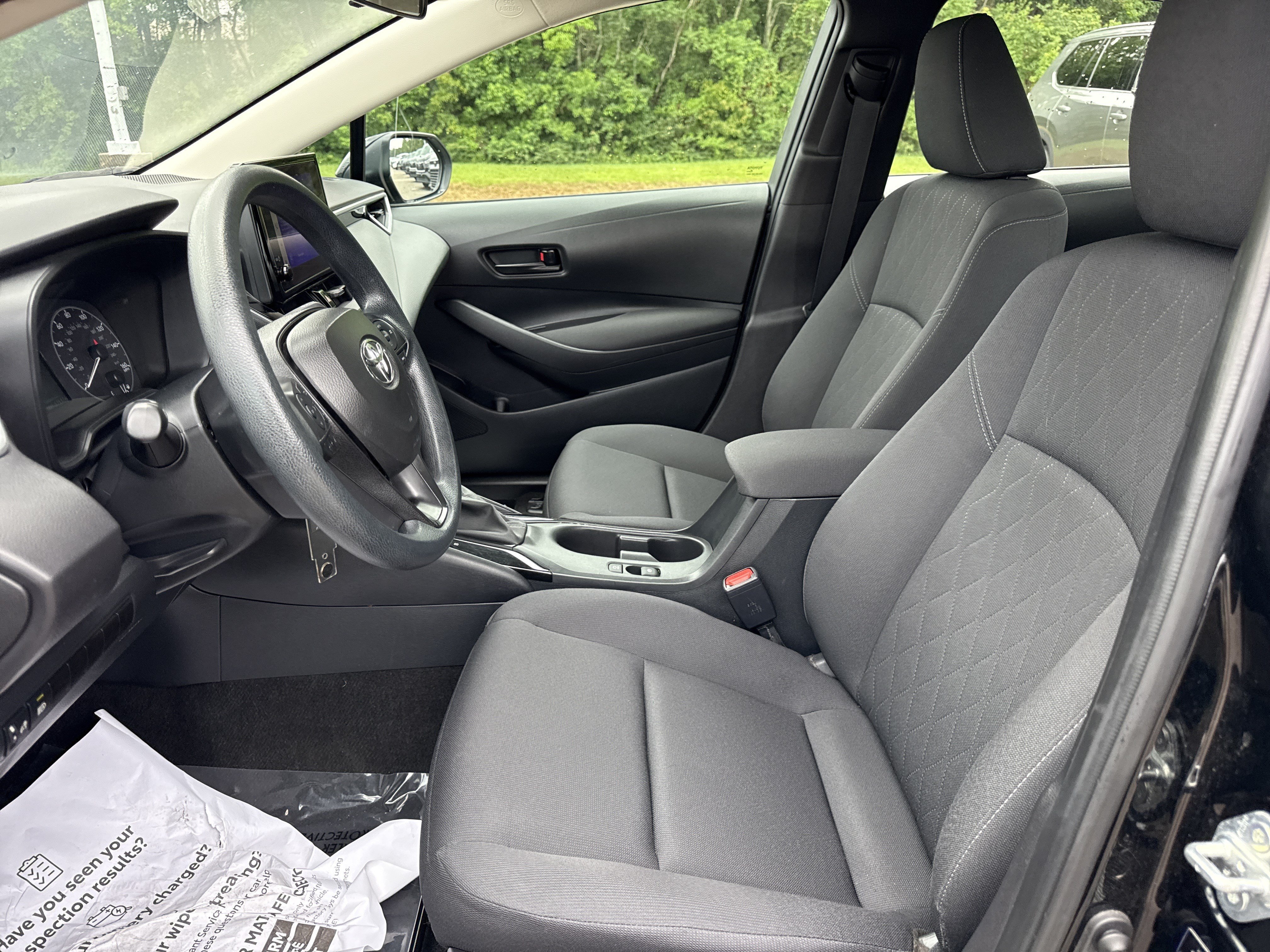 Used 2024 Midnight Black Metallic Toyota LE image 11