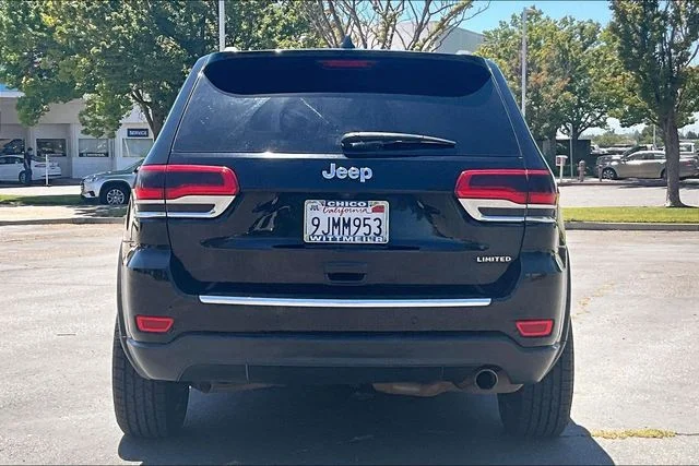 Used 2019 Diamond Black Jeep Limited image 4