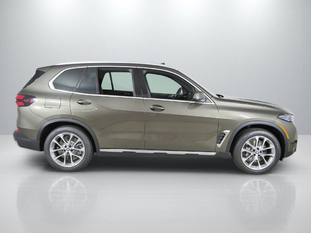 New 2026 Manhattan Green Metallic BMW xDrive50e image 8
