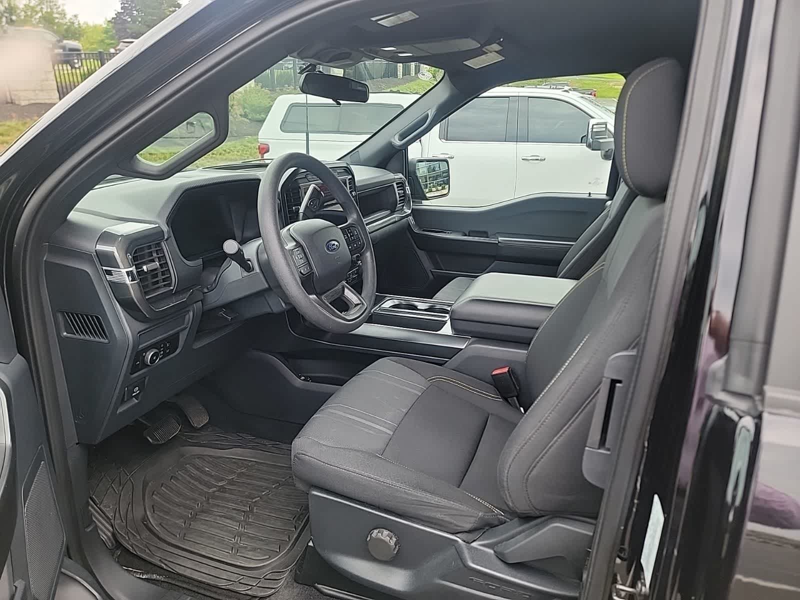 Used 2024 Agate Black Metallic Ford STX image 2