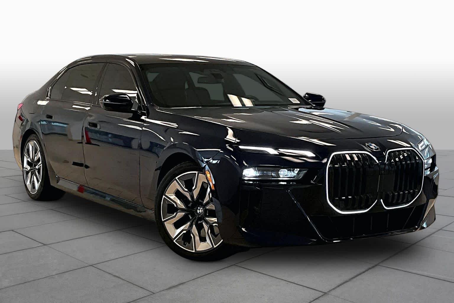 Used 2025 Tanzanite Blue II Metallic BMW 740i image 2