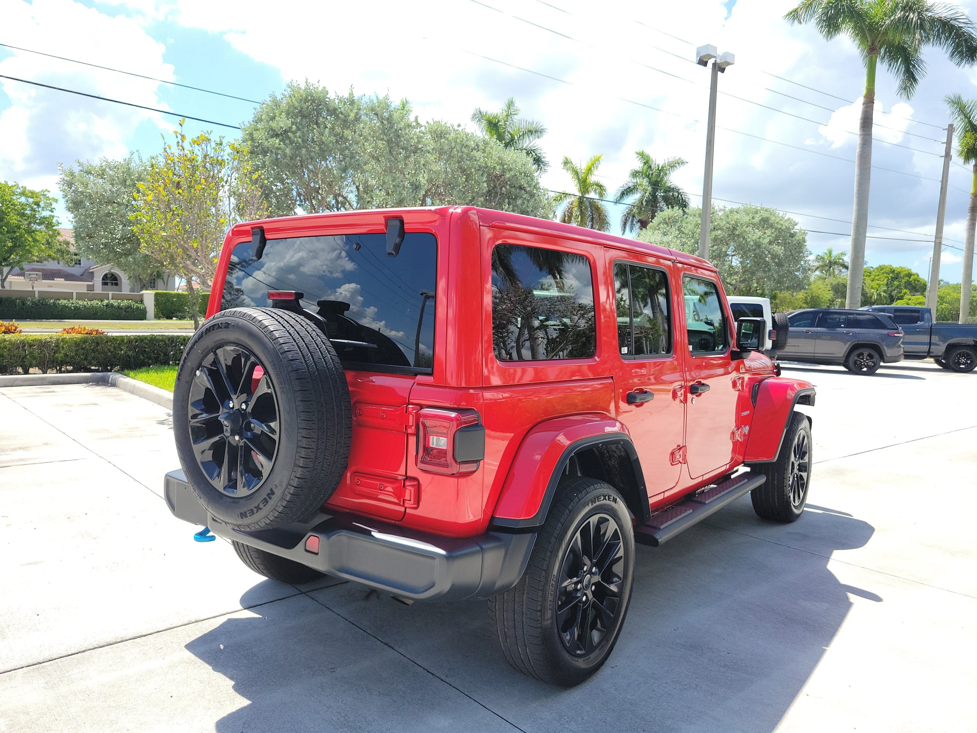 Used 2024 Firecracker Red Clearcoat Jeep Sahara image 8