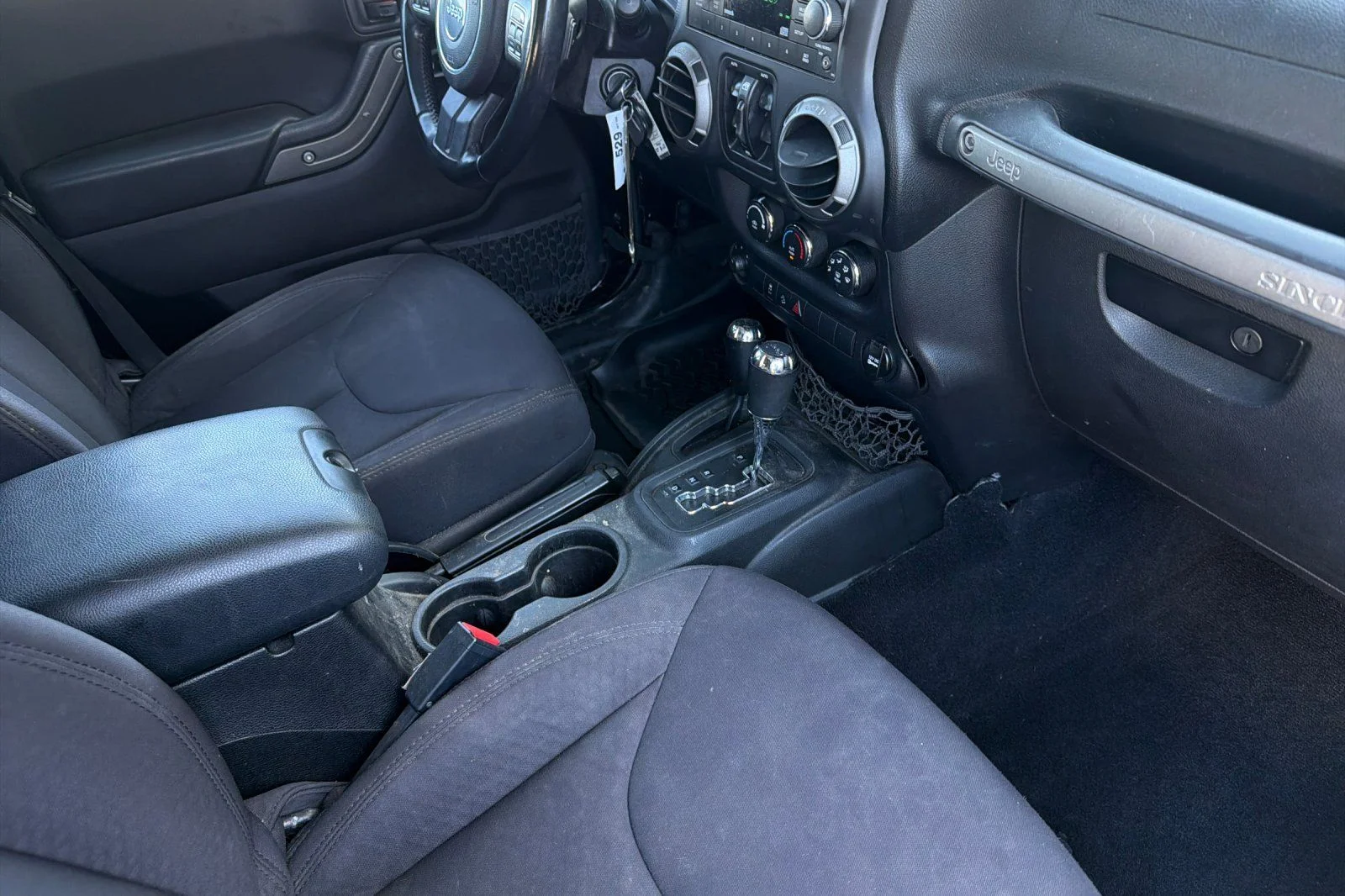 Used 2013 Black Jeep Unlimited Sport image 18