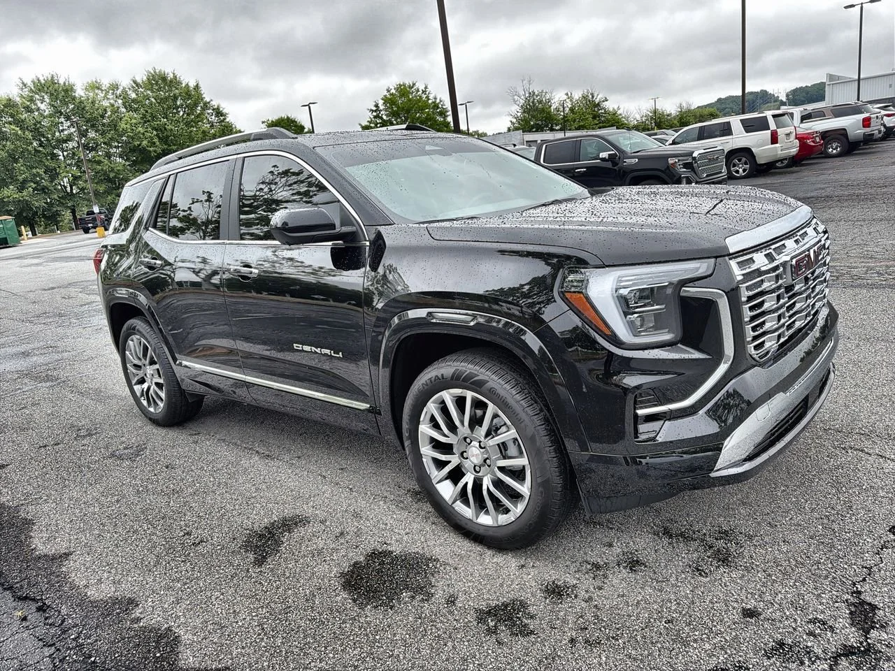 Used 2026 Ebony Twilight Metallic GMC Denali image 2