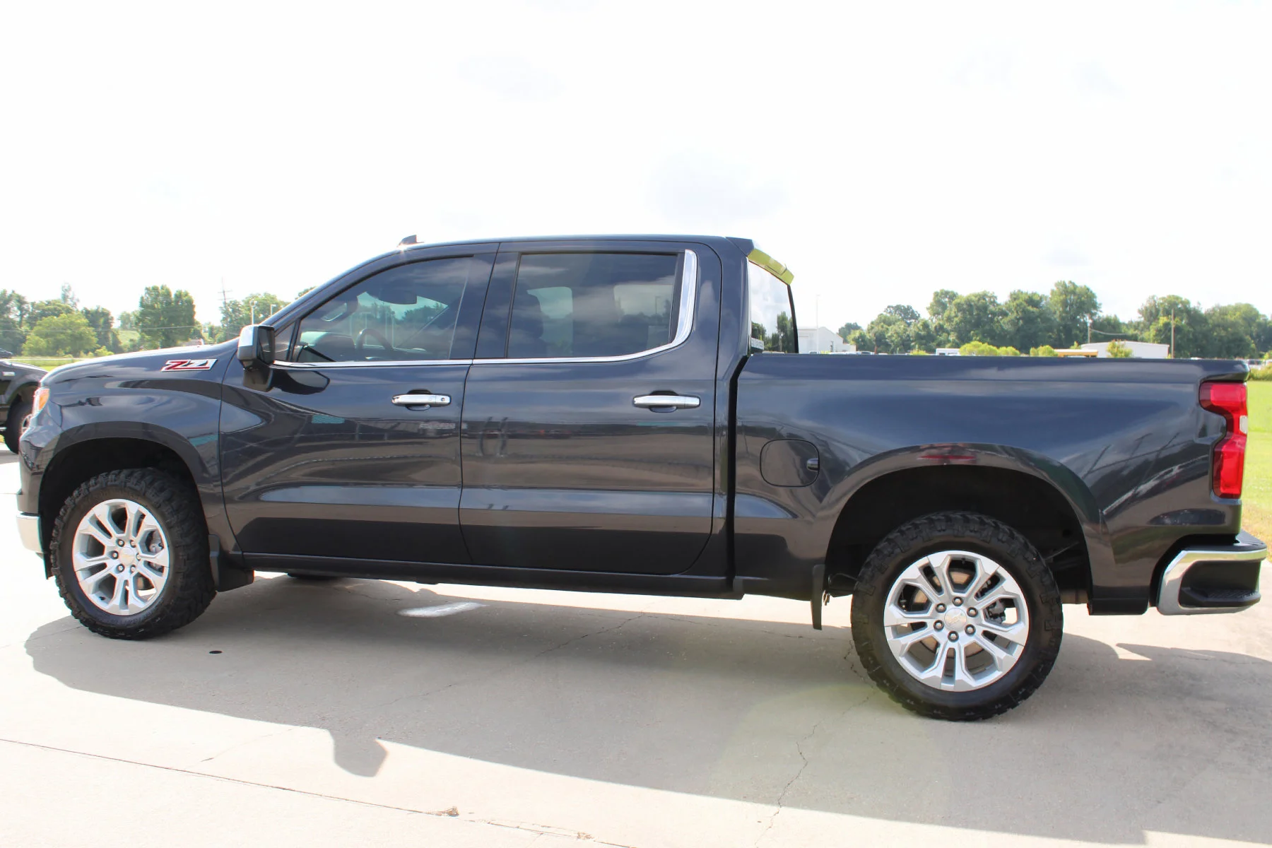 Used 2023 Dark Ash Metallic Chevrolet 4WD Crew Cab 147 LTZ image 36