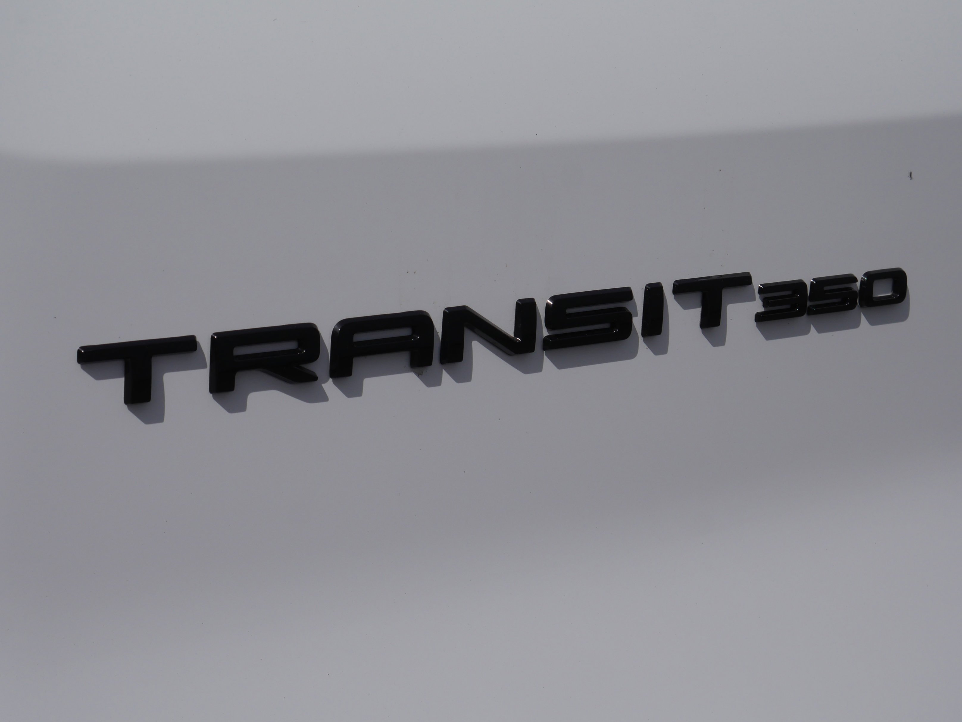 New 2026 Oxford White Ford Passenger Van XLT image 18