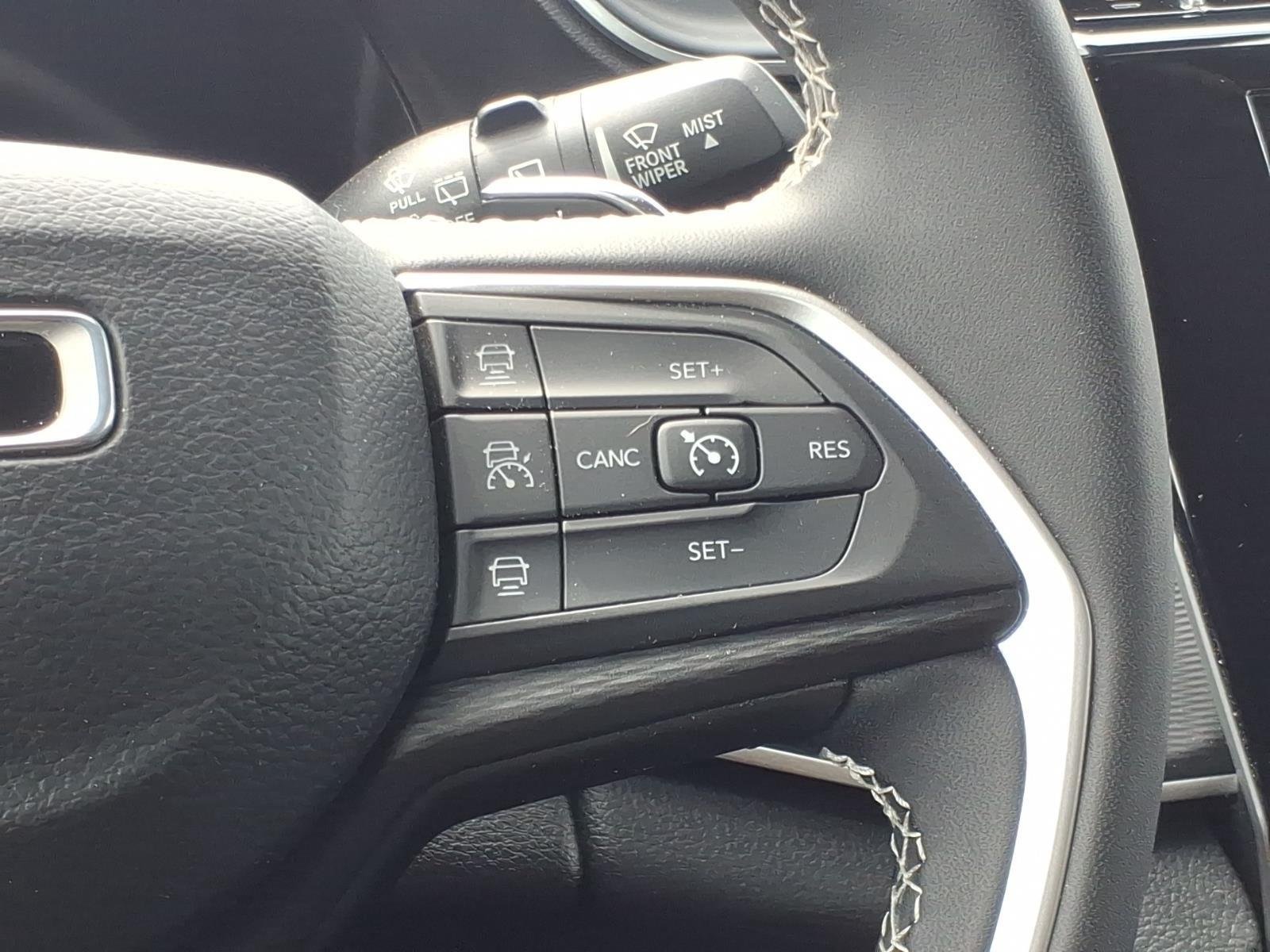 Used 2023 Velvet Red Pearlcoat Jeep Laredo image 27