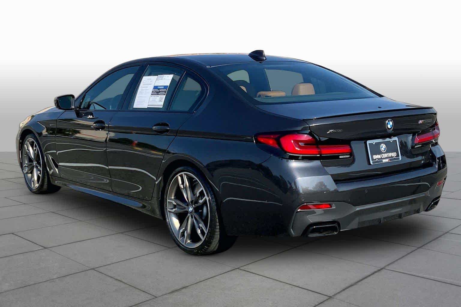 Certified Used 2023 Dark Graphite Metallic BMW M550i xDrive image 11