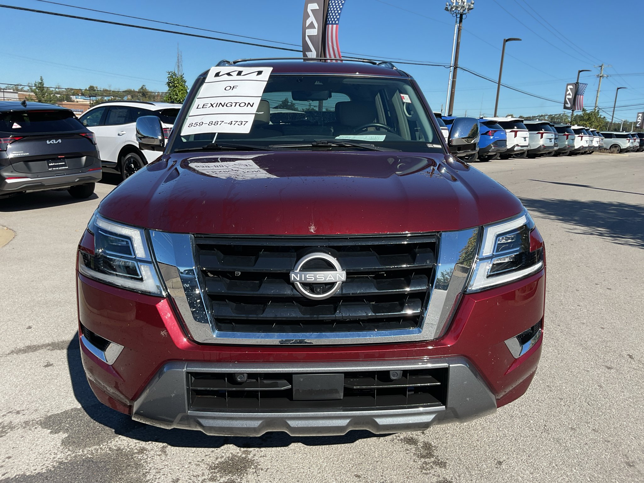 Used 2023 Coulis Red Pearl Nissan Platinum image 3