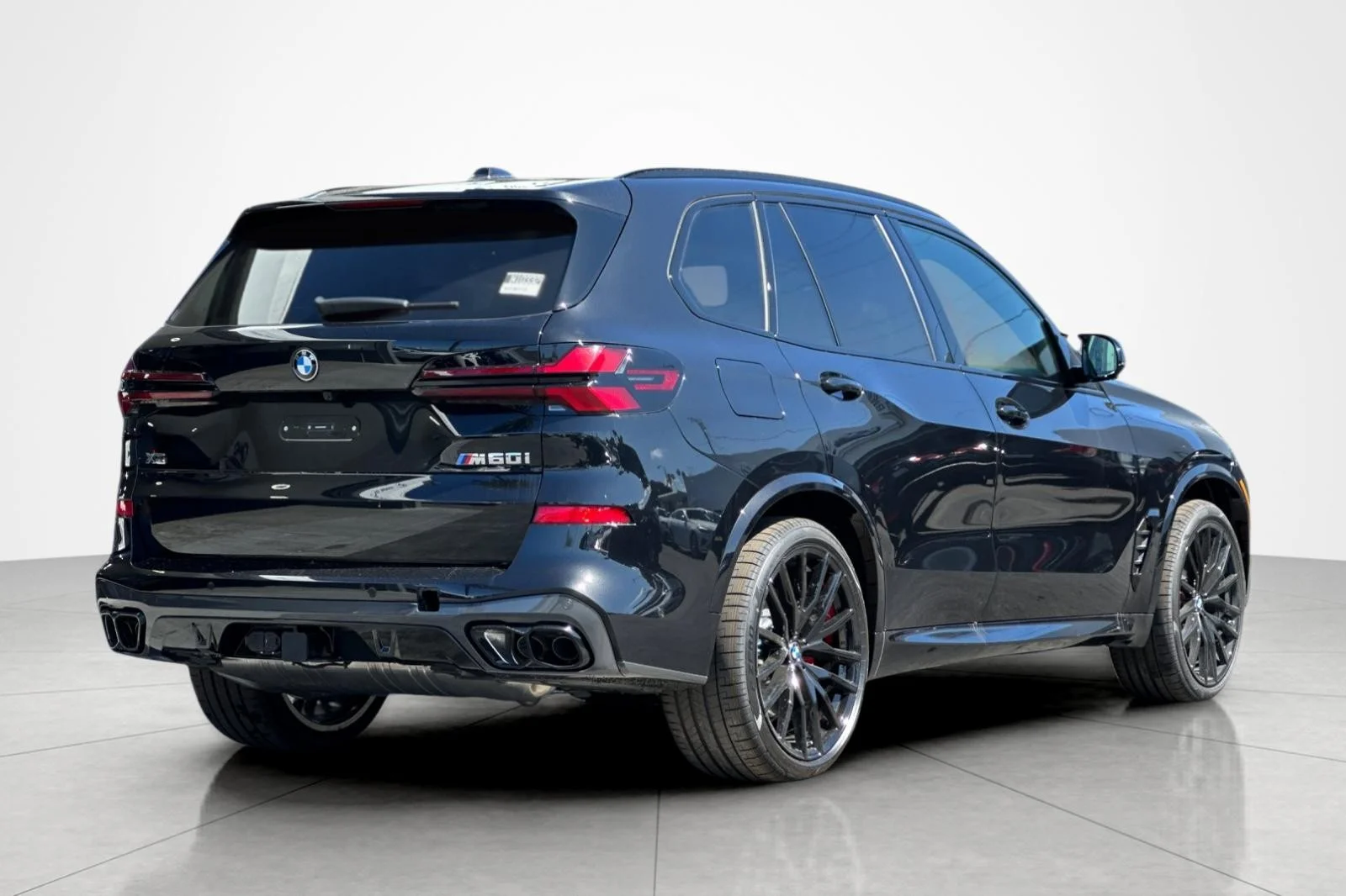 New 2026 Black Sapphire Metallic BMW M60i image 5