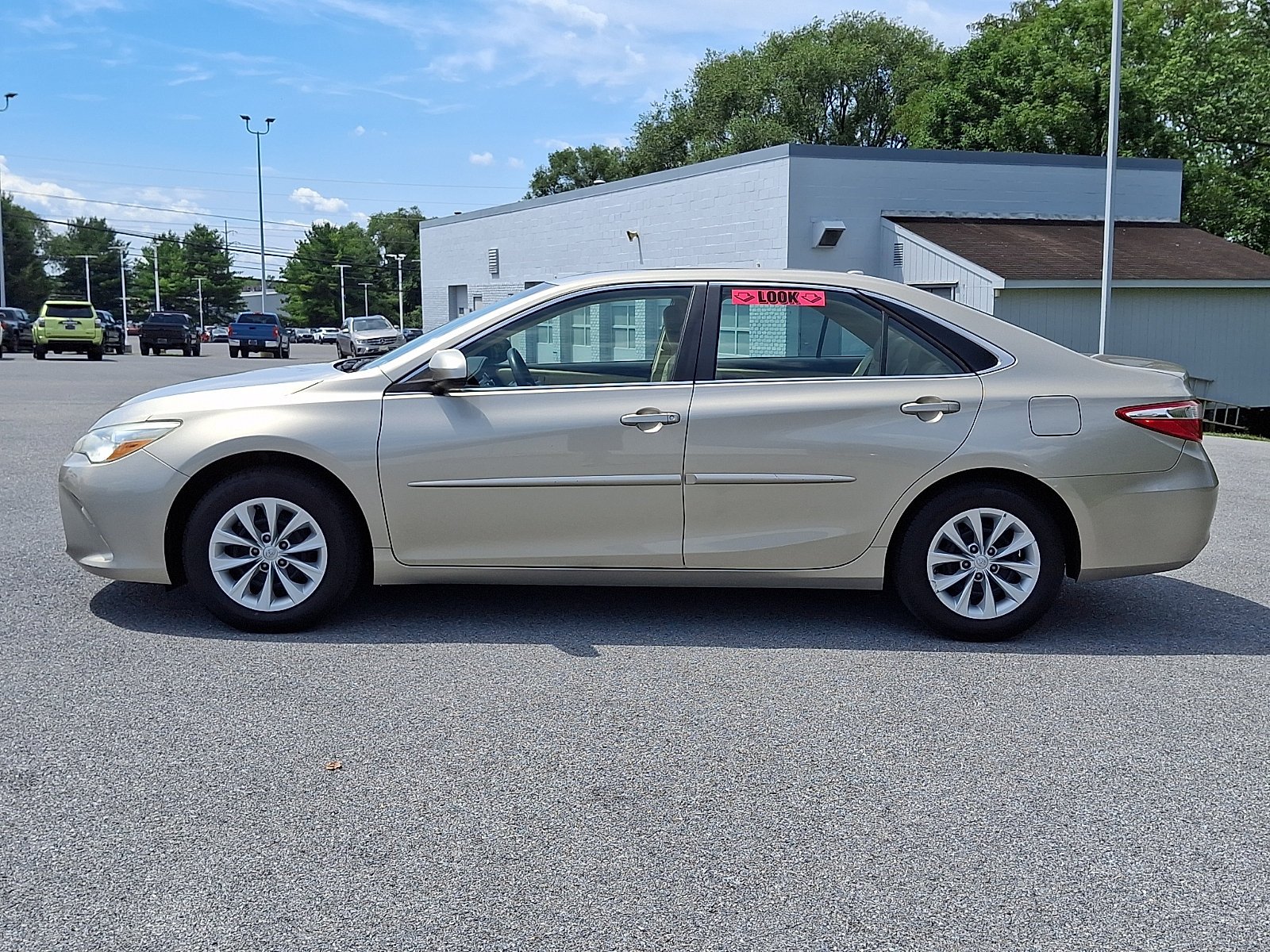 Used 2015 Creme Brulee Mica Toyota LE image 4