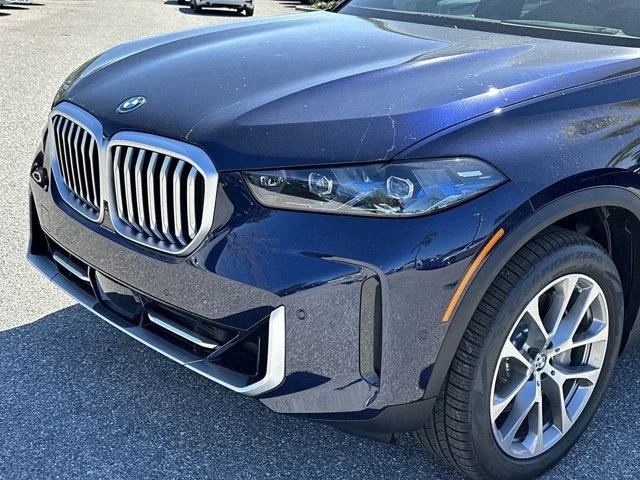 New 2026 Tanzanite Blue II Metallic BMW xDrive50e image 8
