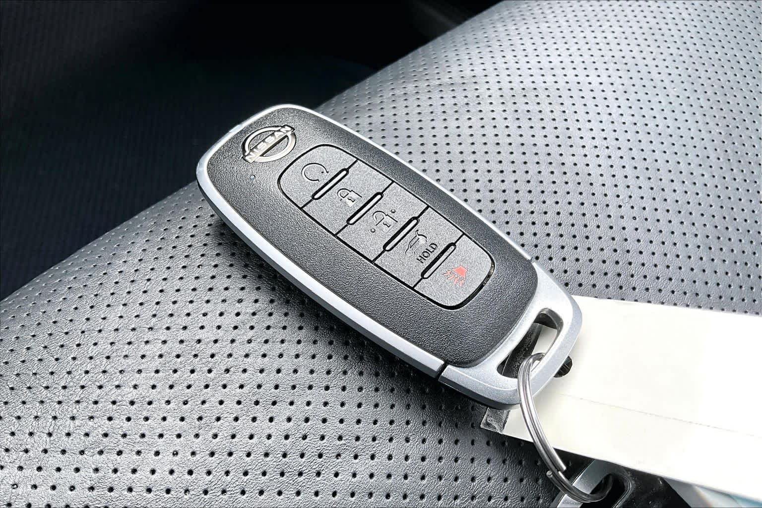 Used 2023 Pearl White Tricoat/Super Black Nissan Platinum image 15