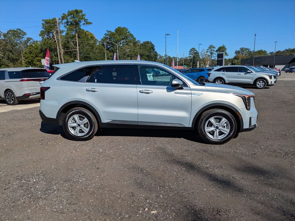 New 2026 Ivory Silver Kia LX image 2