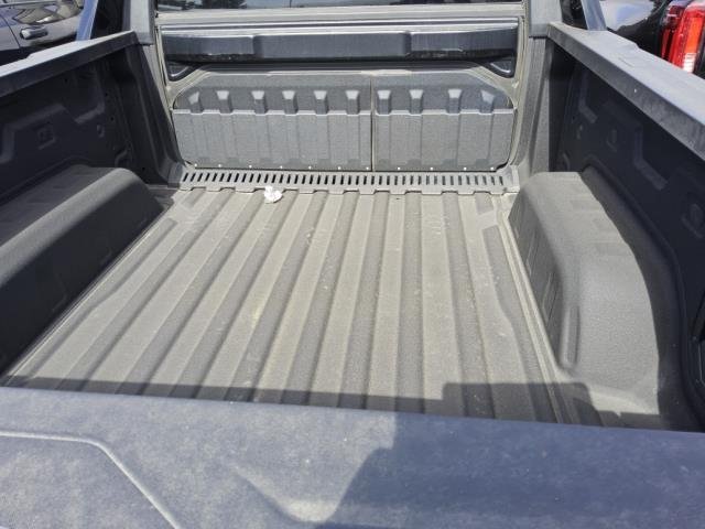 Used 2025 Onyx Black GMC Max Range Denali image 7
