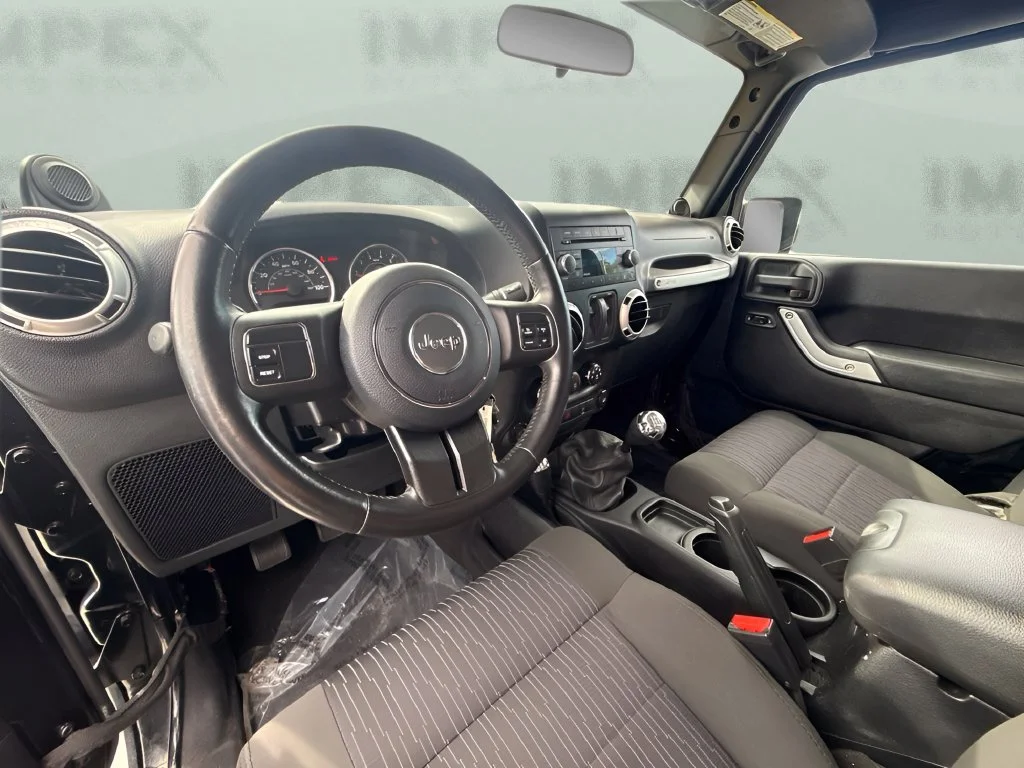 Used 2011 Black Jeep Sahara image 11