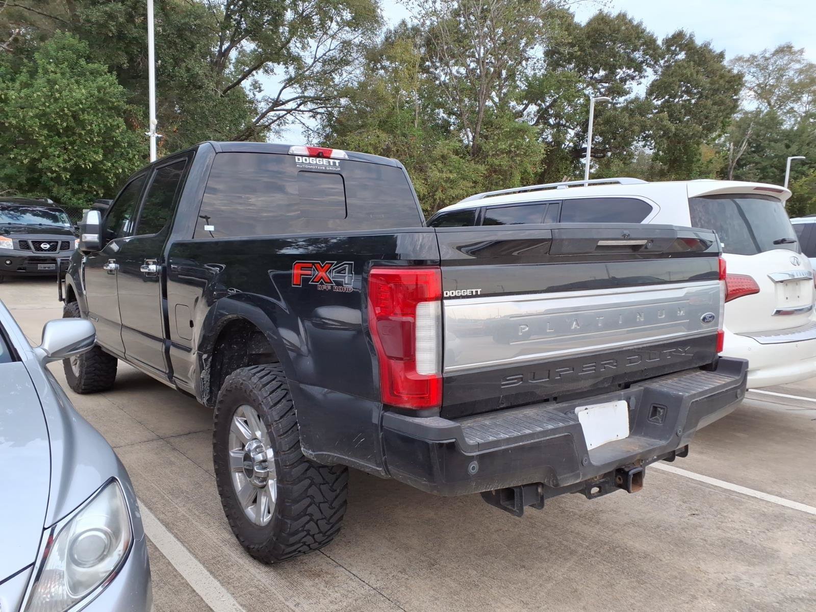Used 2019 Black Metallic Ford Platinum image 2