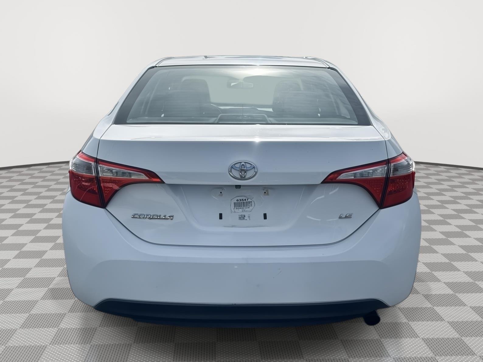 Used 2014 Super White Toyota LE image 5