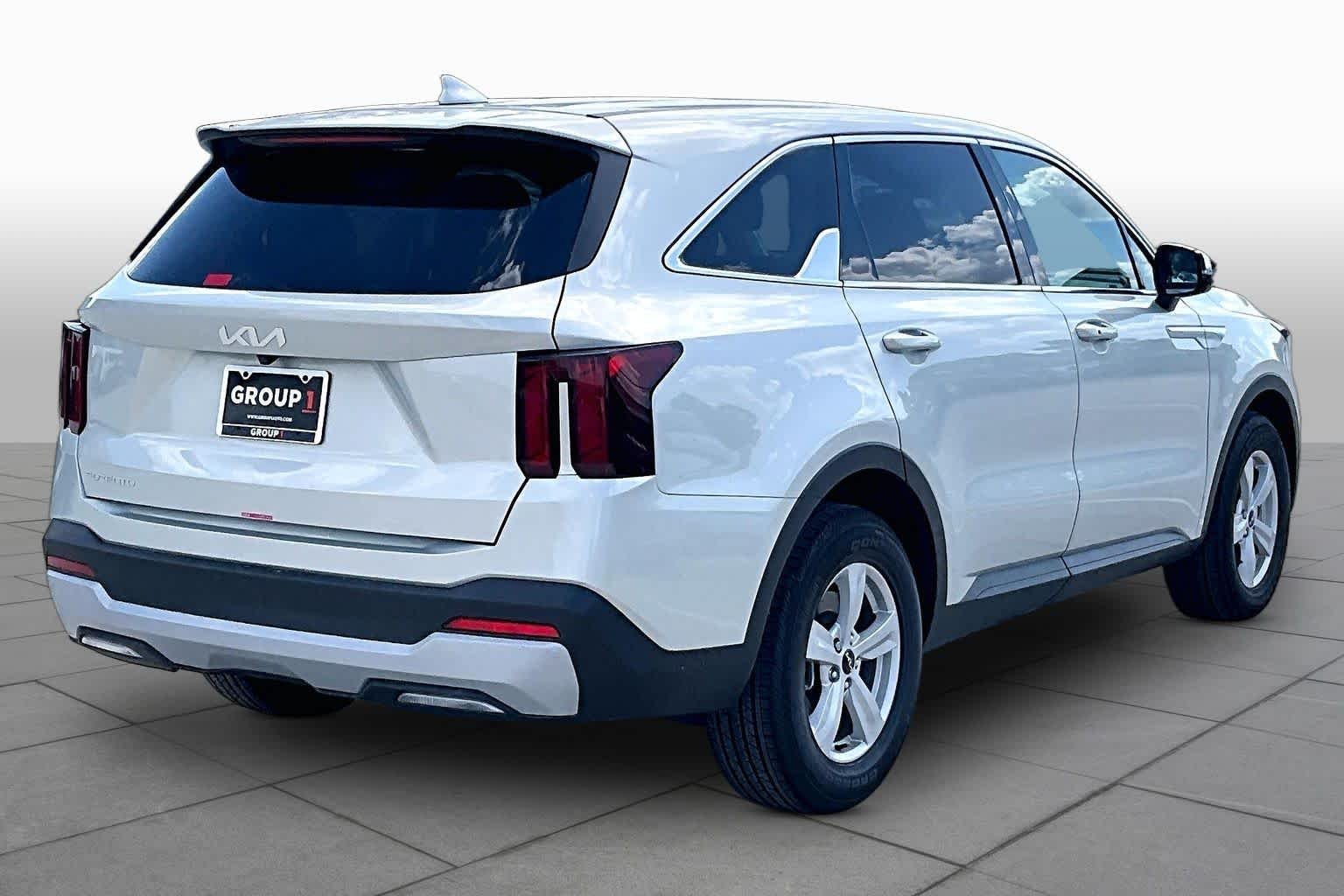 New 2026 Ivory Silver Kia LX image 11