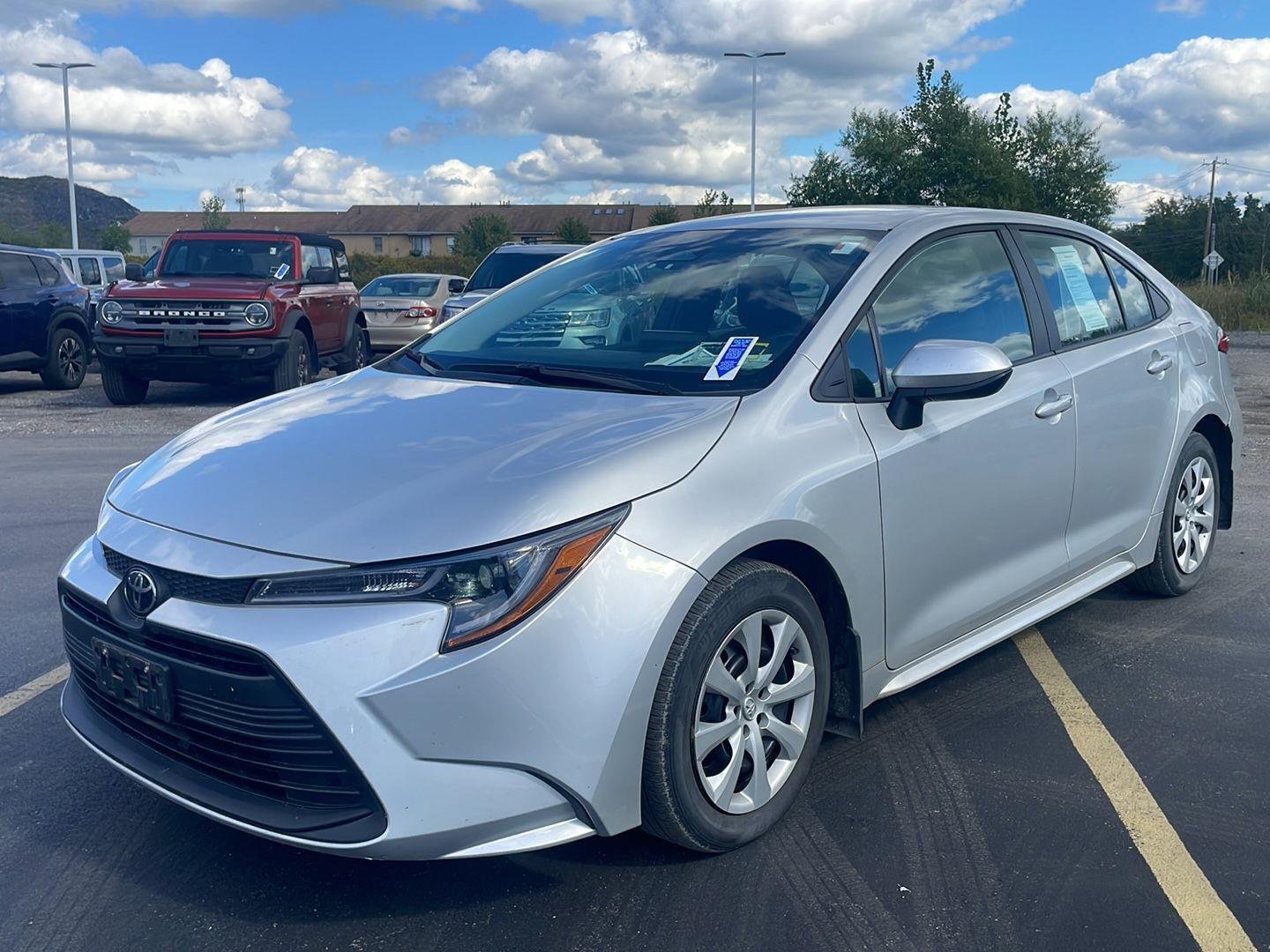 Used 2024 Classic Silver Metallic Toyota LE image 7