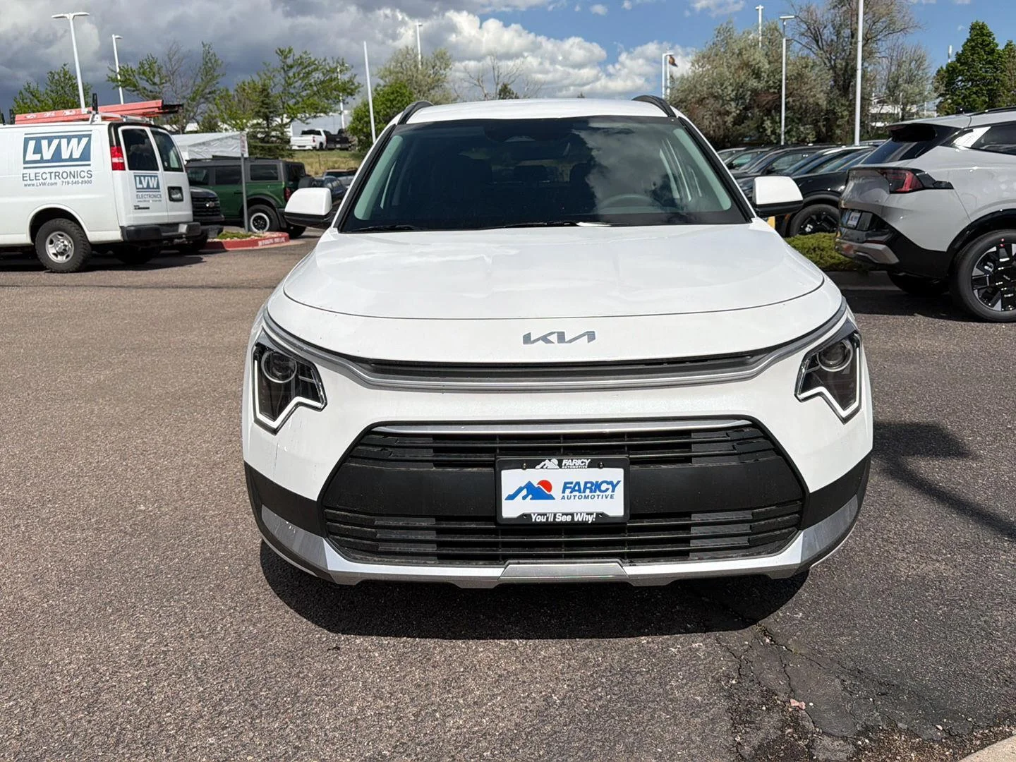 New 2026 Snow White Pearl Kia LX image 2