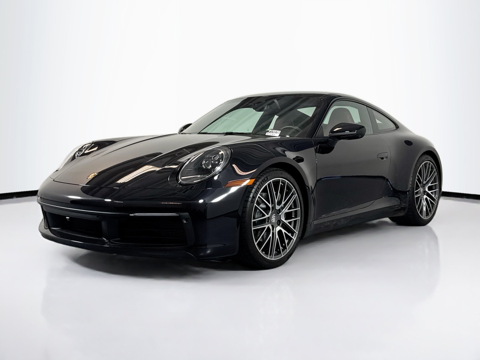 Used 2024 Black Porsche Carrera image 1