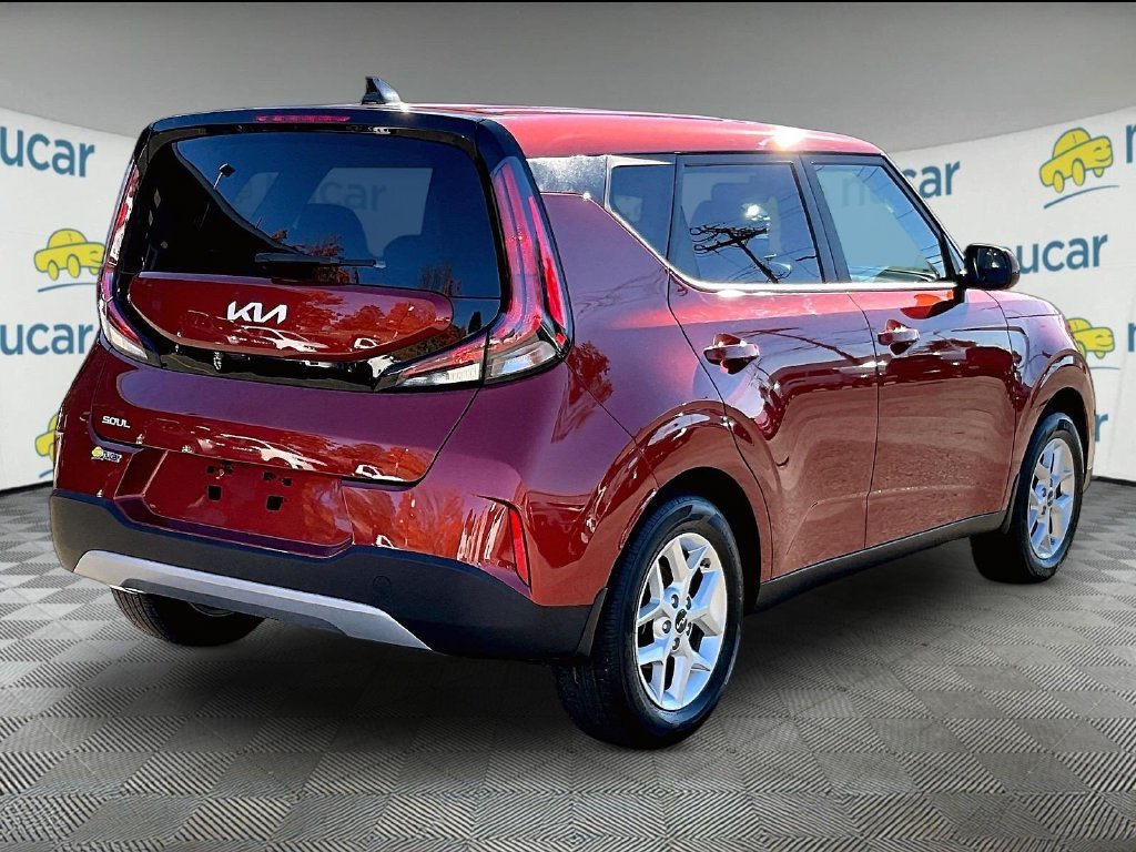 Used 2023 Orange Kia LX image 6