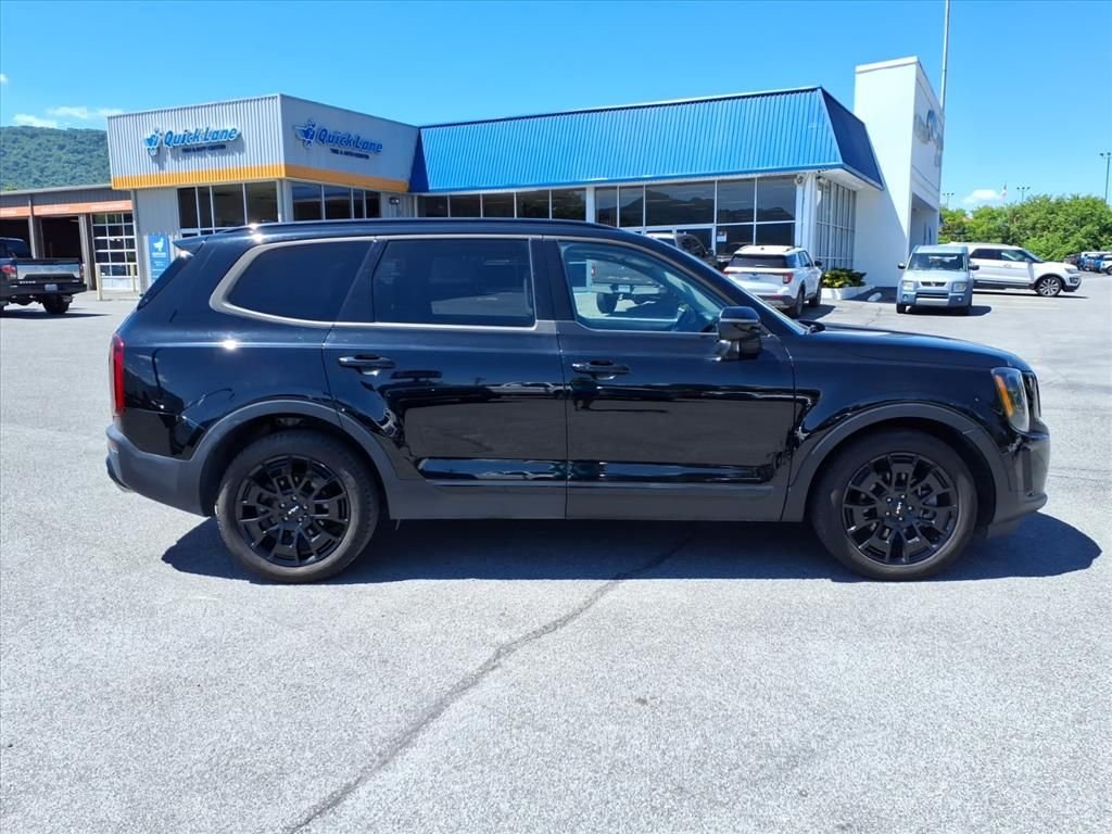 Used 2022 Ebony Black Kia EX image 13