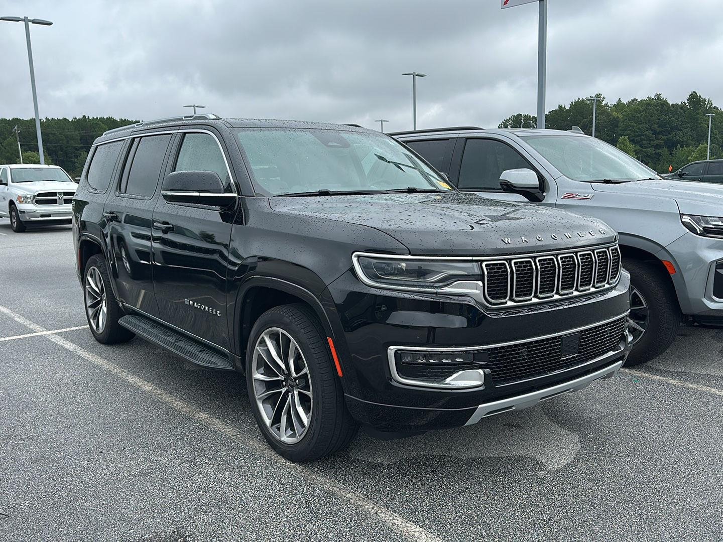 Certified Used 2023 Diamond Black Crystal Pearlcoat Jeep Series II image 1
