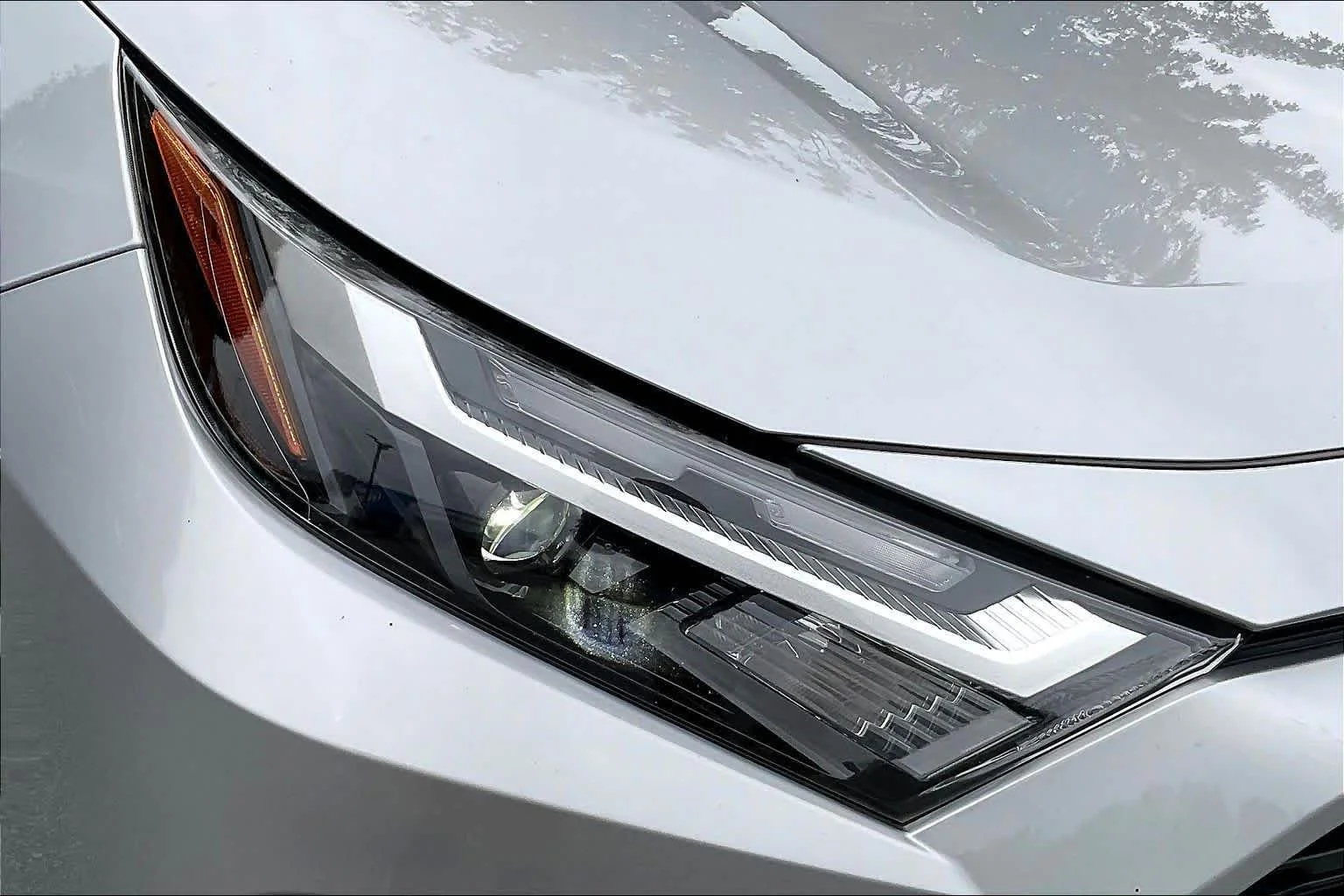 Used 2022 Silver Sky Metallic Toyota Hybrid XLE image 28