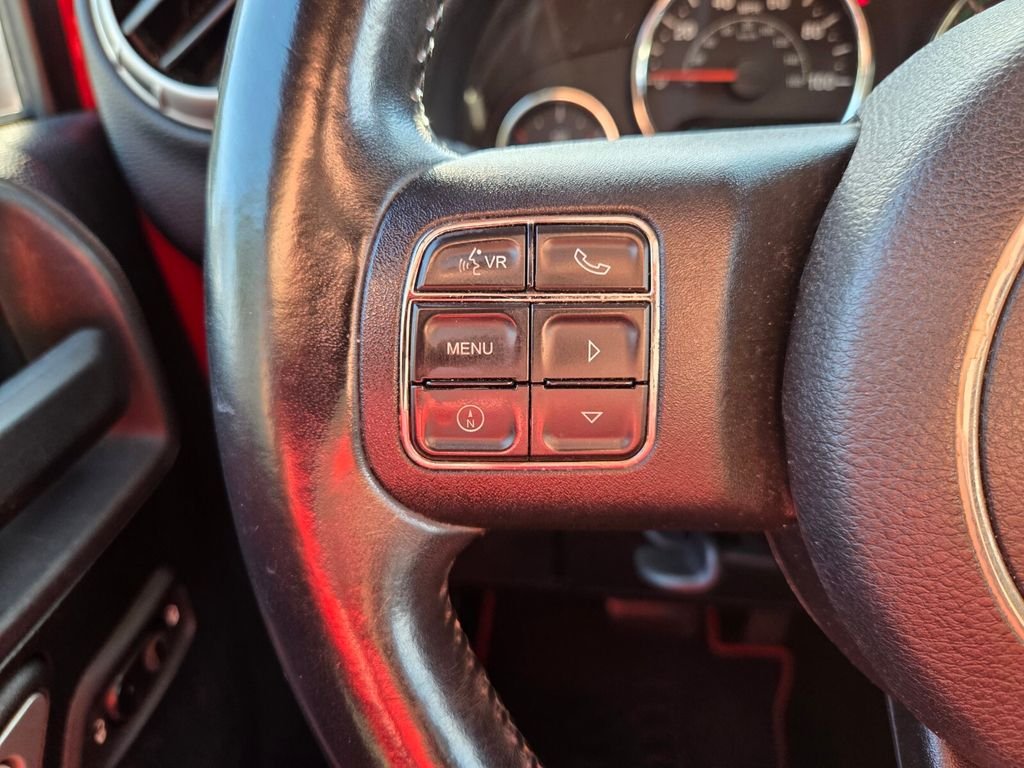Used 2015 Red Jeep Unlimited Sahara image 28