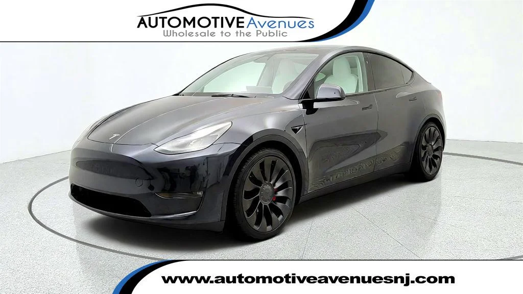 Used 2024 Stealth Grey Tesla Performance AWD w/ White & Black Interior image 1