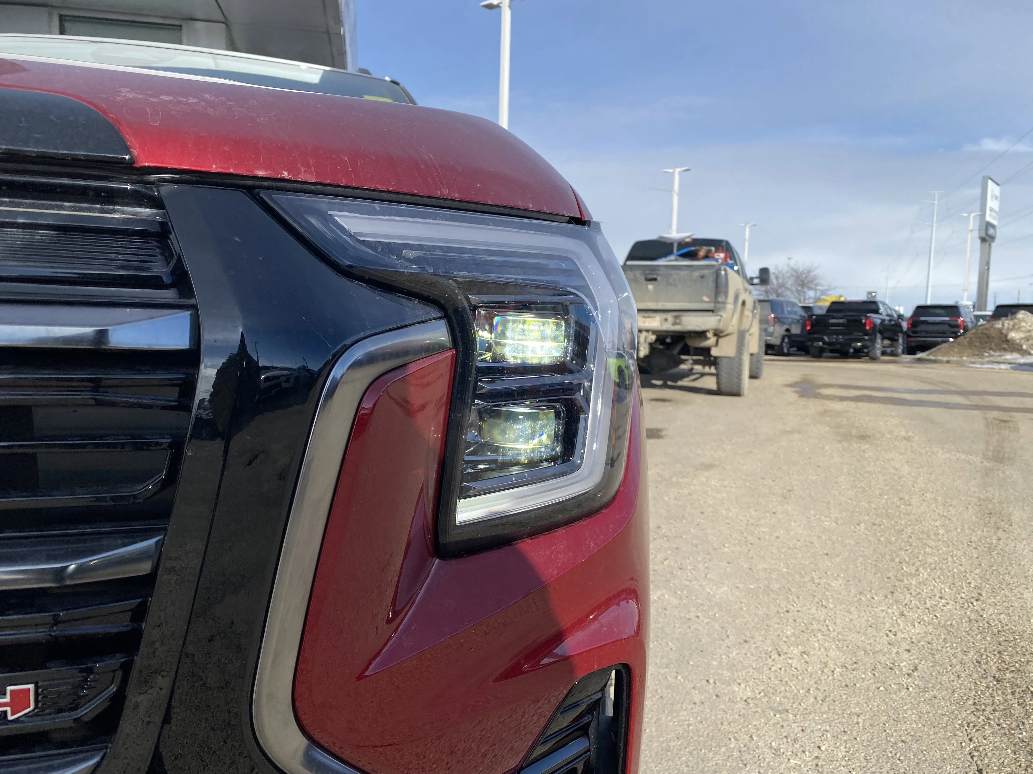 New 2026 VOLCANIC RED TINTCOAT GMC AWD AT4 image 10