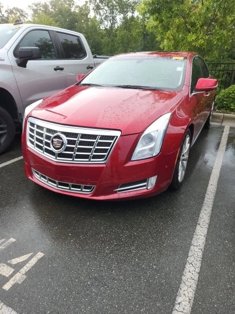Used 2015 Red Cadillac Luxury image 1