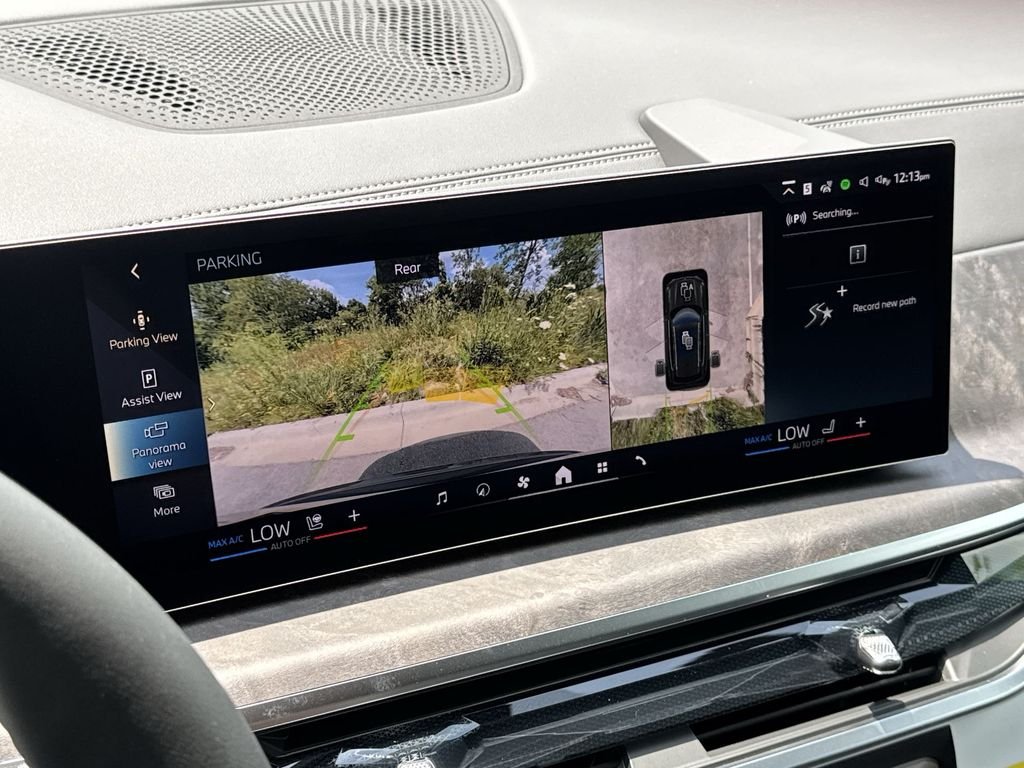 New 2026 Manhattan Green Metallic BMW xDrive50e image 24