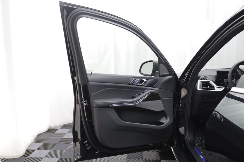 New 2026 Black Sapphire Metallic BMW xDrive50e image 6