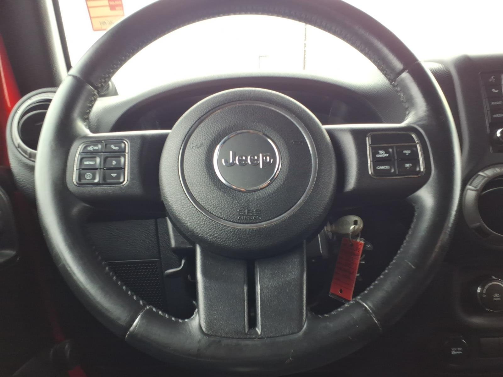 Used 2013 Flame Red Clearcoat Jeep Sport image 24