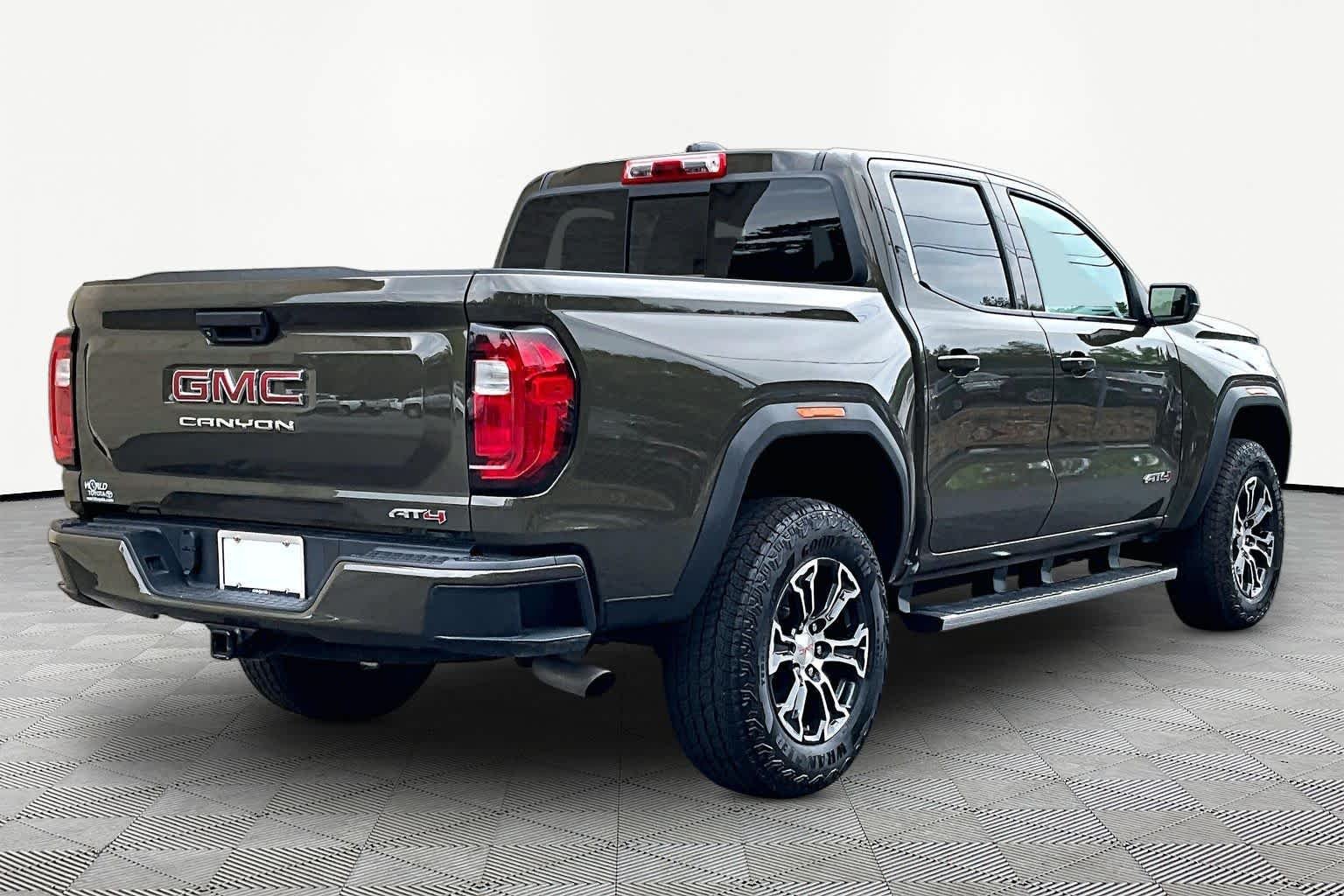 Used 2023 Deep Bronze Metallic GMC 4WD AT4 image 13