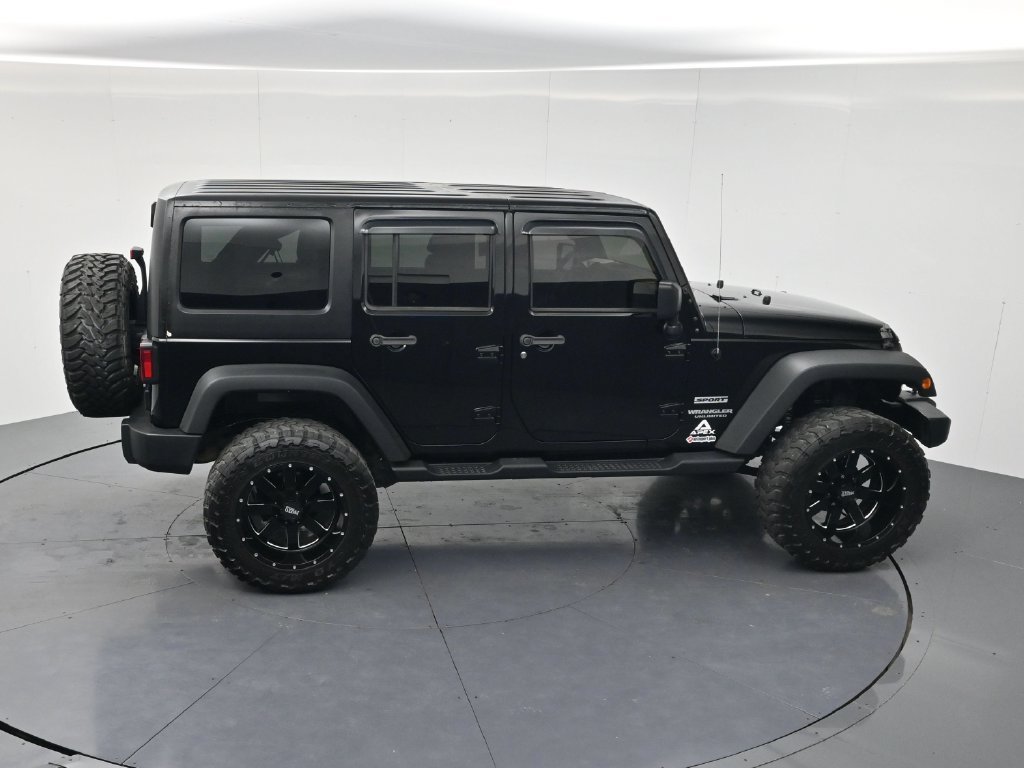 Used 2014 Black Clearcoat Jeep Unlimited Sport image 40