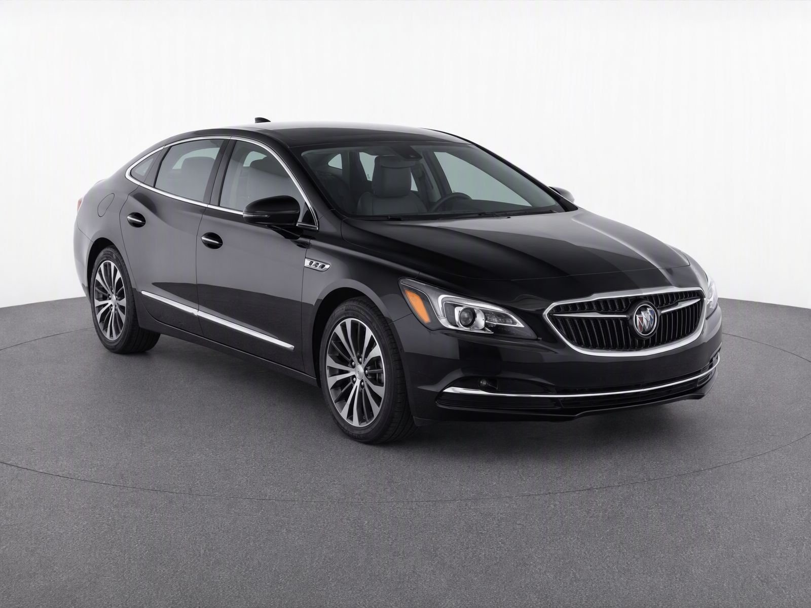 Used 2017 Dark Forest Green Metallic Buick Essence image 1