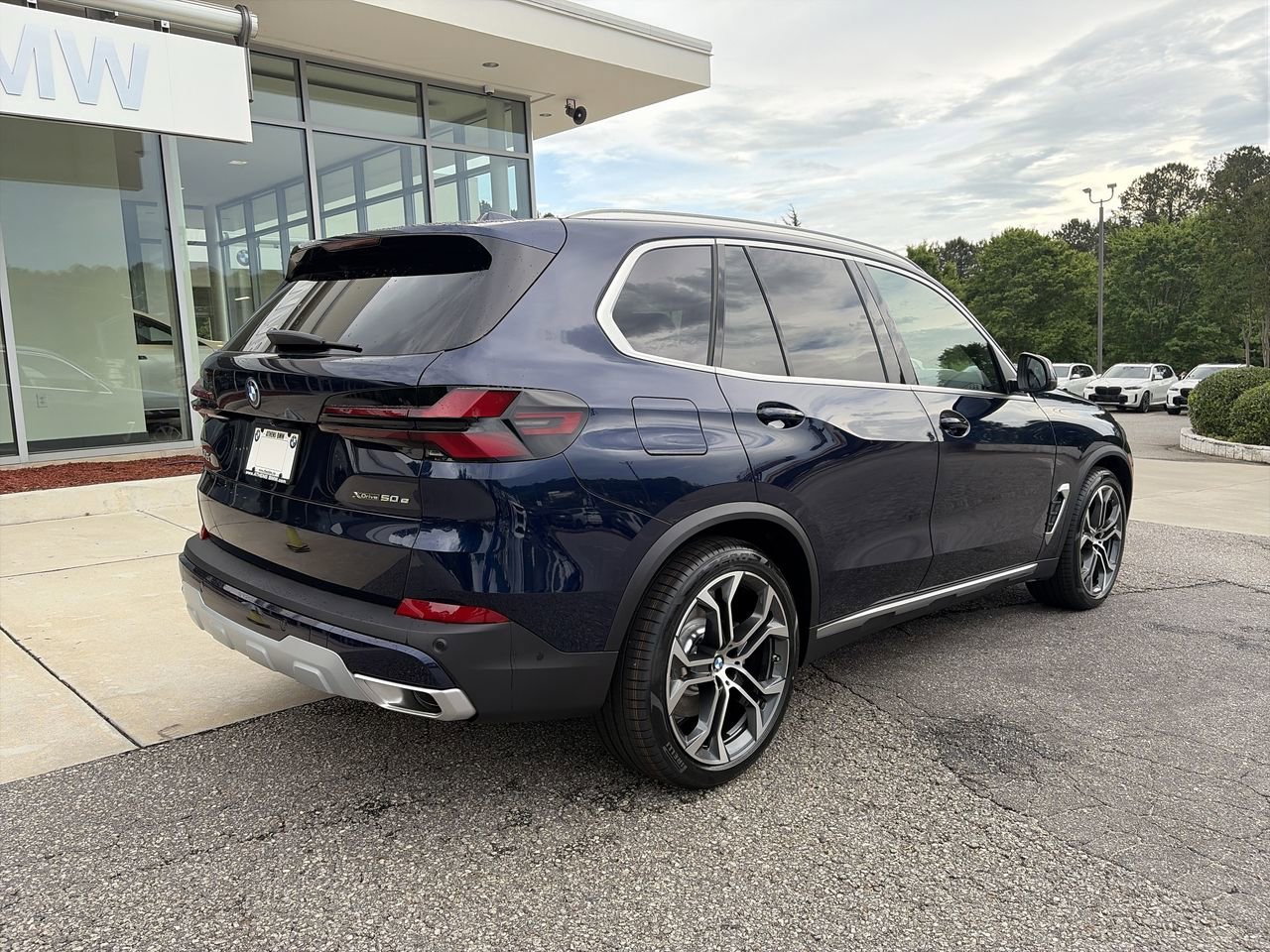 New 2026 Tanzanite Blue II Metallic BMW xDrive50e image 8